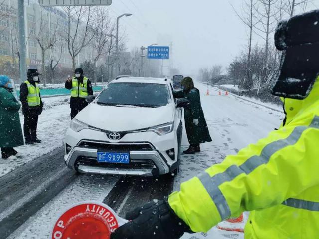 烟台开发区:抗击疫情,他们浴“雪”奋战